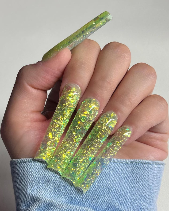 Nail glitter acrylic powder offers a dazzling array of possibilities for  nail art enthusiasts. With its vibrant colors and shimmering effects, this  cosmetic product has become a staple in the world of